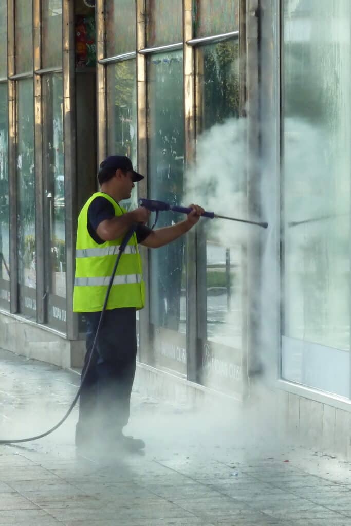 Steam cleaning windows with pressure | Shineo | Office Cleaning Sydney